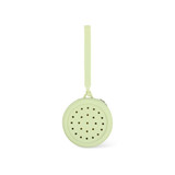 A round silicone pouch in a soft green colour with perforated holes and a strap for easy carrying.