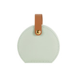 A small portable PU leather jewellery box in mint green with a brown strap and gold button detail.