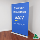 A blue roll-up banner displaying promotional text, featuring a logo and an Australian Made badge on the bottom.