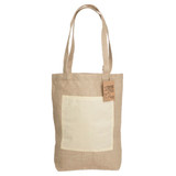 A jute shopping bag in natural beige with a plain cream pocket and straps, featuring a logo on one side.