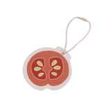 A round, red tomato-shaped promotional item with seeds, featuring a string loop for hanging.