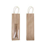 A jute wine carrier in beige with a clear window and white rope handles. Features a logo.