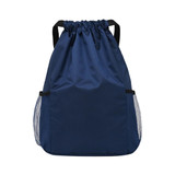 A navy drawstring backpack featuring mesh side pockets and shoulder straps, with a simplistic design.