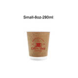 A kraft paper cup with a double wall design, featuring a red logo and text, suitable for hot beverages.