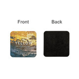 A square frosted metal coaster featuring a yellow front design and a black back. It has a logo.