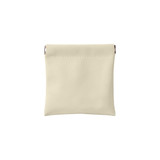 A small, cream-coloured cosmetic bag with a clasp closure and no visible branding.