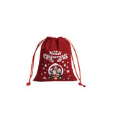 A red drawstring gift bag featuring a festive design with Christmas trees, snowflakes, and Santa.