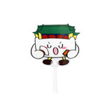 A transparent PVC hand fan featuring a playful character holding items, with a green and red building design.