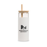 A glass tumbler with a white frosted exterior, wooden lid, and straw, featuring a logo.