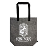A grey tote bag with black handles and a logo featuring mountains and a sun. It has a gusset for added space.