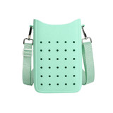 A mint green silicone phone bag with holes and adjustable straps, featuring a simple, minimalist design.