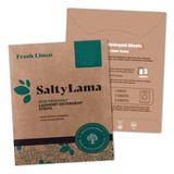 Eco-friendly laundry detergent sheets in brown packaging with green accents, featuring a logo and information on usage.