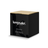 A black box packaging for a Keepsake mortar and pestle set with a logo on the front.