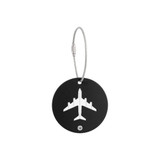 A round black luggage tag featuring a white airplane design, attached with a silver wire cable.
