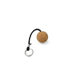 A cork ball keyring featuring a round cork ball with a black strap and silver keyring attachment.