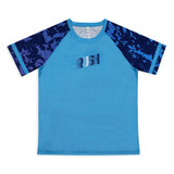 A custom women's active T-shirt in blue with patterned navy sleeves and a logo on the front.