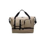 A tan travel weekender bag with multiple pockets and black handles. It features a detachable strap and a sleek design.