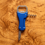 A drink bottle opener in blue, featuring a knife, corkscrew, and a bottle opener, set on a wooden background.
