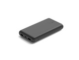 A black power bank with a sleek design, featuring USB ports and a logo. Includes an LED indicator for charge status.