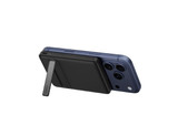 A black magnetic power bank attached to a blue smartphone, featuring a stand on the back. It has branding visible.