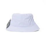 A light blue bucket hat with a wide brim; features a tag with branding.