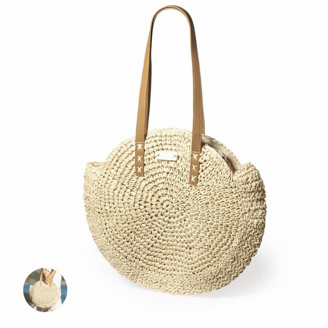 A cream-coloured woven tote bag with tan straps. The bag features a round shape and has a logo. A cream-coloured woven tote bag with tan straps. The bag features a round shape and has a logo.