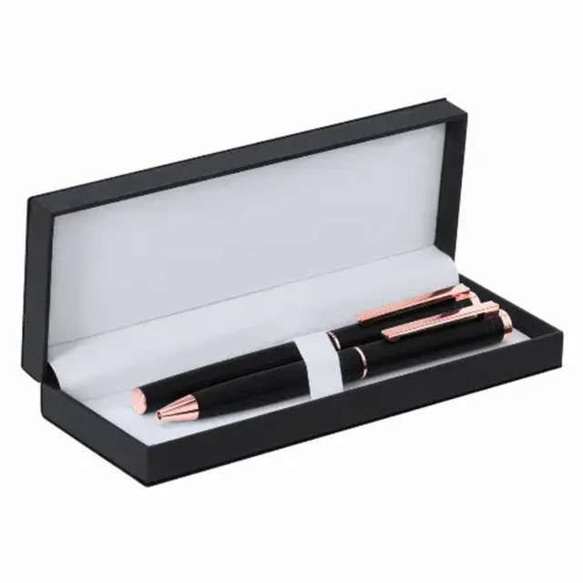 A pen set in a black box featuring two metallic pens with rose gold accents.