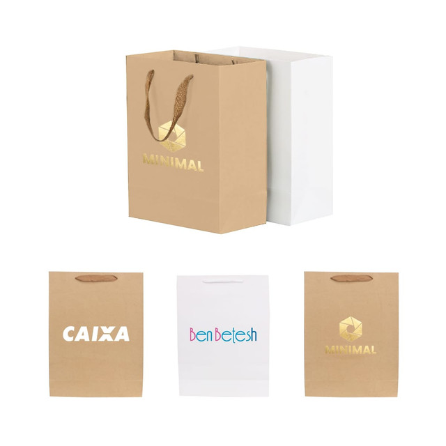 A large vertical paper bag in brown with fabric flat handles, alongside a white paper bag, both featuring logos.