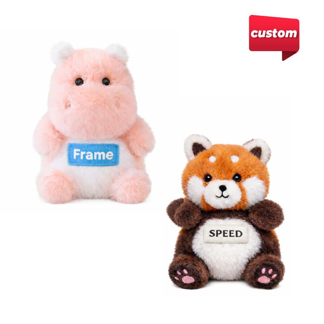 A pink hippo plush toy and a brown and orange red panda plush toy, both with labels, featuring soft fur.