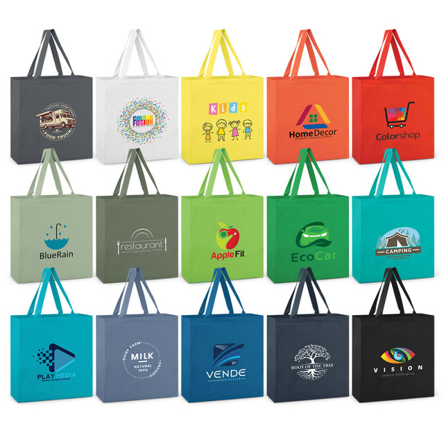 A collection of Carnaby cotton tote bags in various colours, featuring different logos and designs.