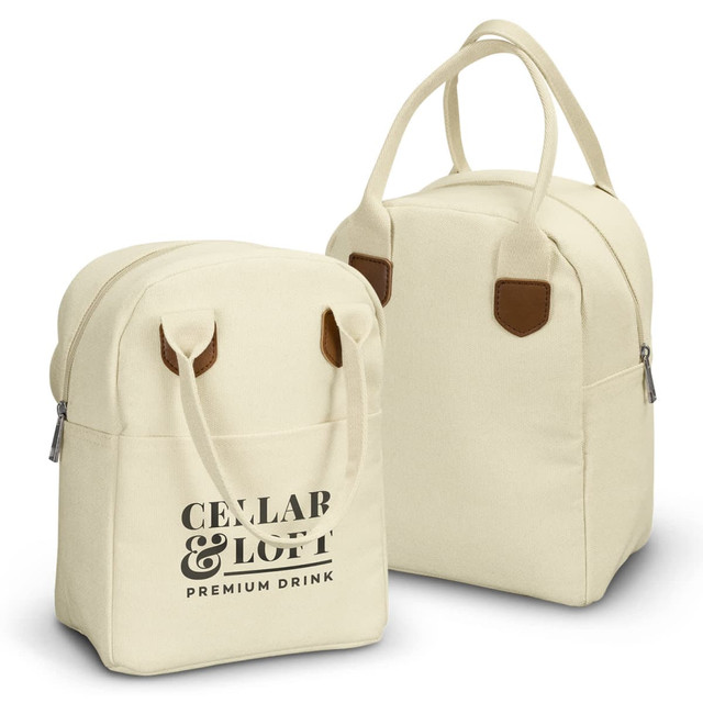 A cream lunch bag with a logo, featuring two handles and faux leather accents. A cream lunch bag with a logo, featuring two handles and faux leather accents.
