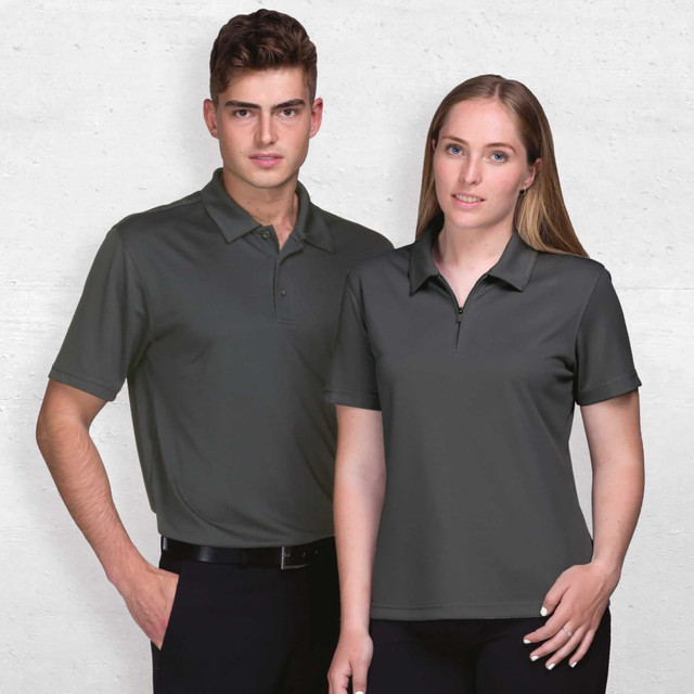 A grey Dri Gear Axis Polo for men and a matching women's version, both featuring a logo.