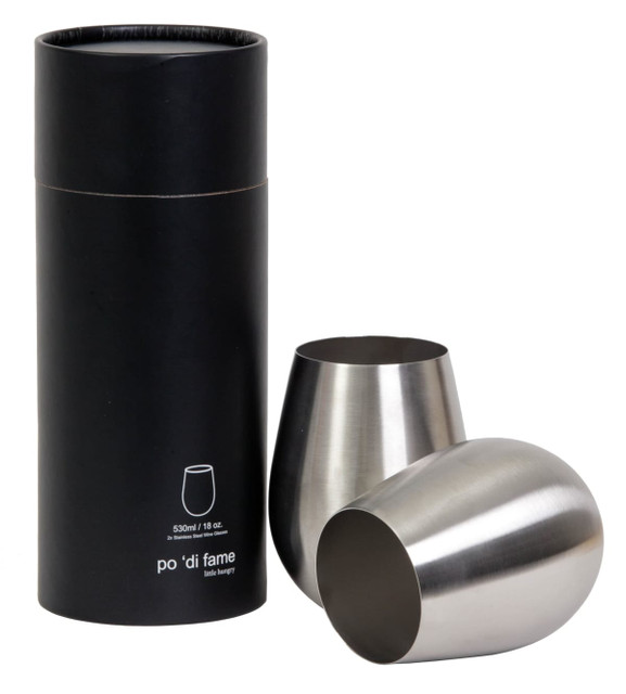 A set of two stemless stainless steel wine glasses in a cylindrical black box. The glasses have a sleek metallic finish.