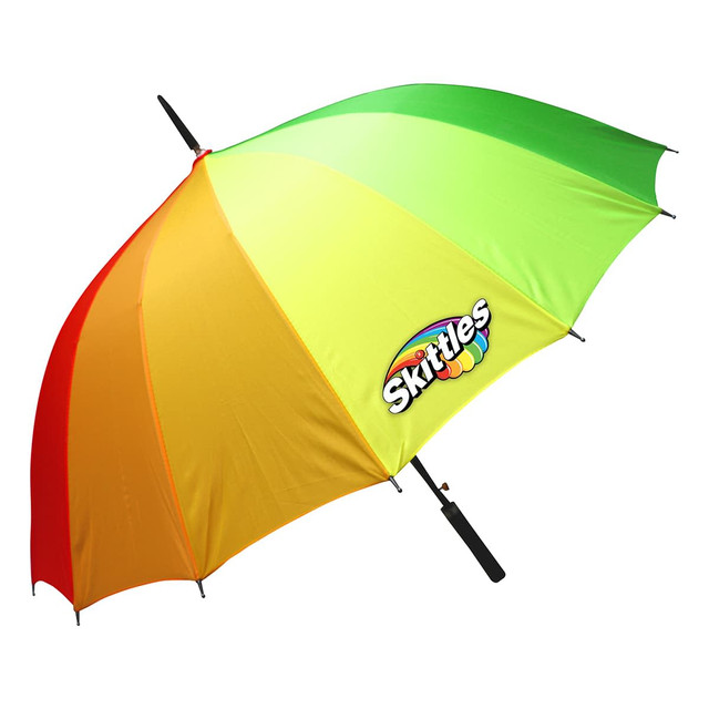 A multi-coloured umbrella featuring green, yellow, and orange sections, with a logo on one side.