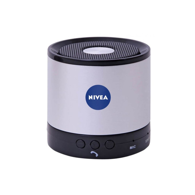 A silver and black portable speaker with a top mesh grille and a prominent logo. Features buttons for operation.