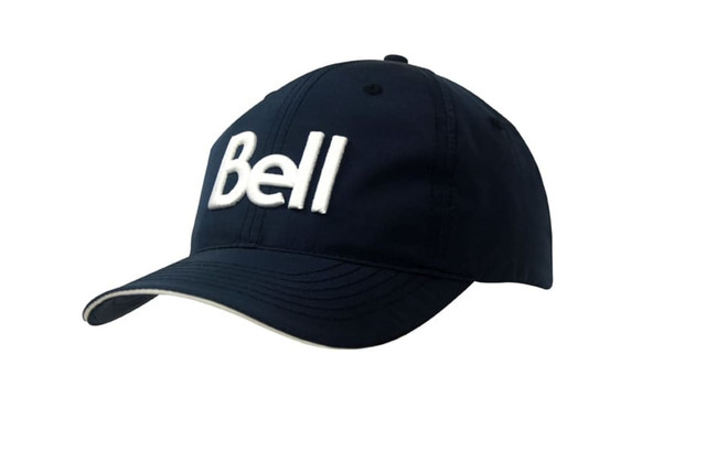 A navy cap with a white branded logo, featuring a wind strap and clip on the back.