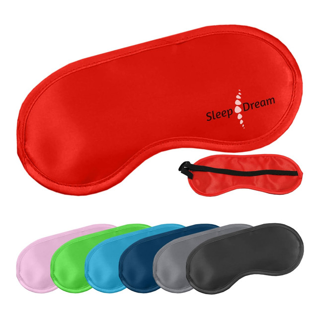 A collection of satin sleep eye masks in various colours including red, pink, green, blue, and grey. One has a logo.