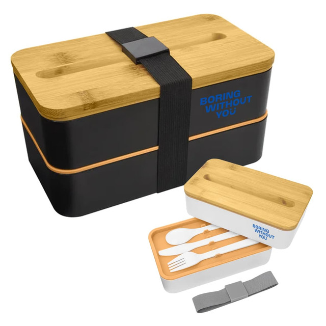 A bamboo and black lunch box pack with cutlery and a strap, featuring a logo on the lid.