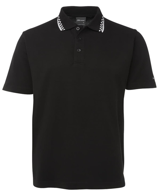 A black chef polo featuring a white check-pattern collar and buttons. It has a logo on the sleeve.