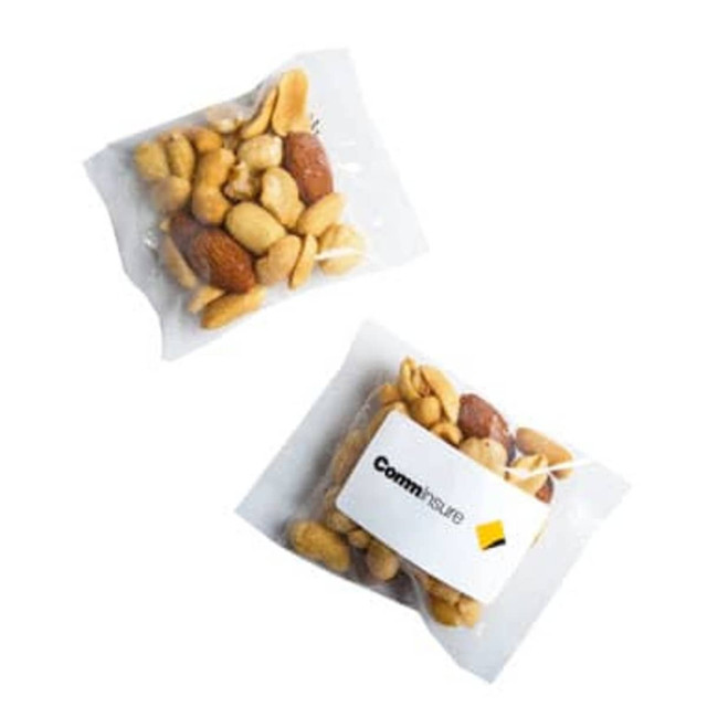 A bag of mixed nuts in a clear wrapper featuring a branded label. Nuts include peanuts and other varieties. A bag of mixed nuts in a clear wrapper featuring a branded label. Nuts include peanuts and other varieties.