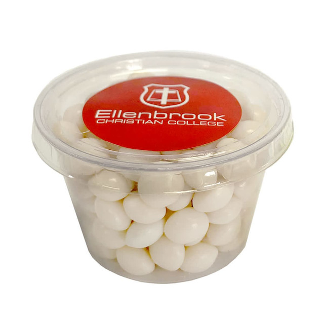 A tub filled with white mints, featuring a branded red lid. A tub filled with white mints, featuring a branded red lid.