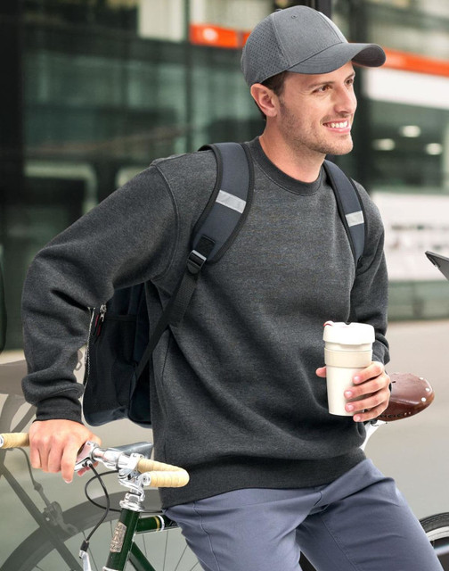 A black crewneck sweatshirt worn by a woman and a man, featuring a simple design and a logo.
