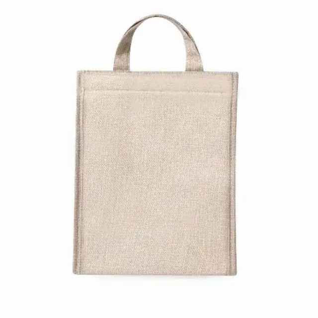 A beige cooler bag with a textured finish and a handle, featuring a simple design and a branding logo. A beige cooler bag with a textured finish and a handle, featuring a simple design and a branding logo.