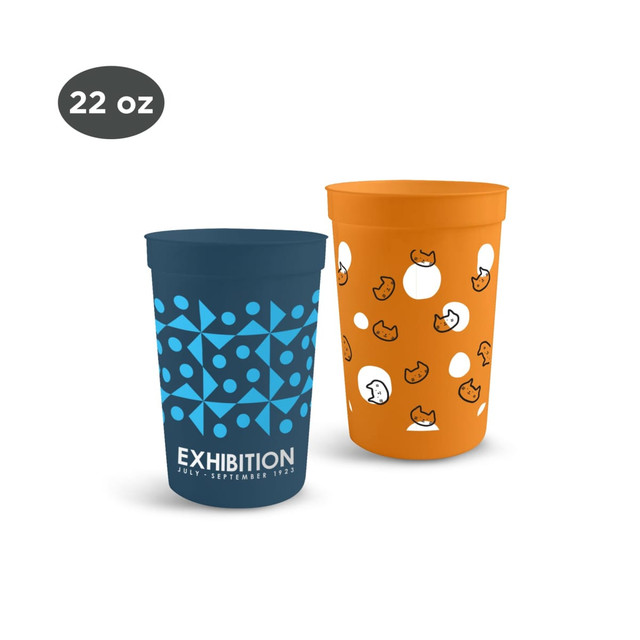 Two plastic stadium cups: one in navy with geometric patterns, the other in orange featuring playful cat designs.