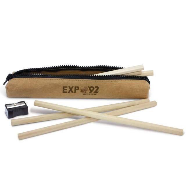 A beige pencil case containing four wooden coloured pencils and a black sharpener, featuring a logo.