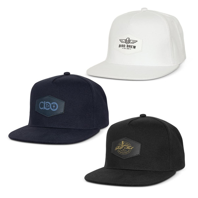 Three flat peak caps in white, navy, and black, each featuring a logo or patch on the front.