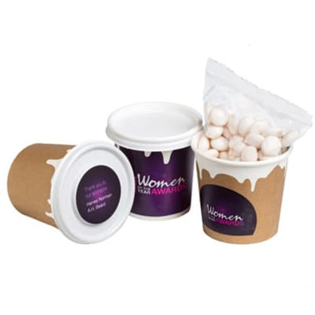 A coffee cup with a lid and mints inside, featuring a brown paper cup design and a branding logo. A coffee cup with a lid and mints inside, featuring a brown paper cup design and a branding logo.