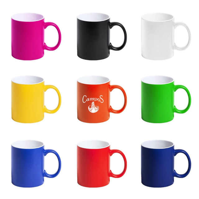 A collection of coffee mugs in pink, black, white, yellow, orange with a logo, green, red, and blue.
