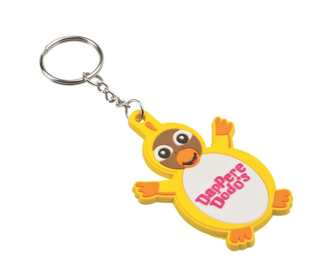 A yellow dodo keyring featuring a cartoon design with a smiling face and a metal keychain attachment.