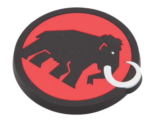A round magnet featuring a black mammoth silhouette on a red background, with a white hook.